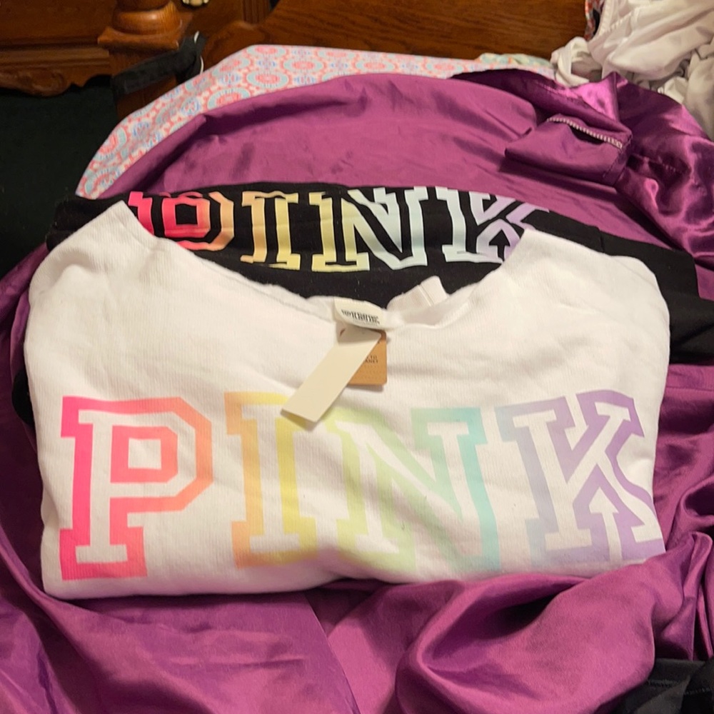 Pink off shoulder sweater jacket and black joggers